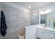 Walk-in shower with sleek glass enclosure and modern fixtures in a bright bathroom at 7036 Heron Rookery Way, Charlotte, NC 28214