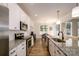 Well-equipped kitchen with granite countertops, stainless steel appliances, and an open design at 7036 Heron Rookery Way, Charlotte, NC 28214