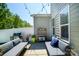 This backyard features a grill, outdoor seating, and flowers at 7036 Heron Rookery Way, Charlotte, NC 28214