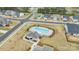 Community pool with lounge area near neighborhood homes at 7662 Tanglewood Way, Denver, NC 28037