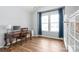 Bright home office with hardwood floors and large windows at 7662 Tanglewood Way, Denver, NC 28037