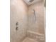 Tiled shower with bench and dual shower heads at 7662 Tanglewood Way, Denver, NC 28037
