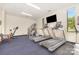 The building's gym is equipped with state-of-the-art treadmills and exercise machines for a complete workout experience at 8308 Knights Bridge Rd, Charlotte, NC 28210