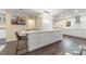 Kitchen features a large island, white cabinets, and modern fixtures at 8308 Knights Bridge Rd, Charlotte, NC 28210