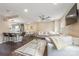 Bright living room with hardwood floors, stylish furnishings, and an open layout to the modern kitchen at 8308 Knights Bridge Rd, Charlotte, NC 28210