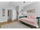 Stylish bedroom featuring a green bed frame, complementary decor, and closet at 835 Ryans Pl, Fort Mill, SC 29715