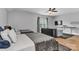 Bright bedroom features two beds, ceiling fan, and hardwood floors at 835 Ryans Pl, Fort Mill, SC 29715