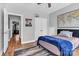 Cozy bedroom featuring wall decor, a world map, and an open doorway at 835 Ryans Pl, Fort Mill, SC 29715