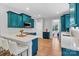 Bright, open kitchen with quartz counters, and a breakfast bar at 835 Ryans Pl, Fort Mill, SC 29715