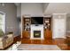 Inviting living room featuring a cozy fireplace with built-in shelving, perfect for relaxing and entertaining at 8621 Sequoia Grove Ln, Charlotte, NC 28214