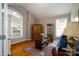 Cozy living room with hardwood floors, a large window, and comfortable seating at 8621 Sequoia Grove Ln, Charlotte, NC 28214