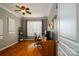 Comfortable home office with wood floors, ceiling fan, and natural light at 8621 Sequoia Grove Ln, Charlotte, NC 28214