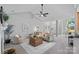 Spacious living area with vaulted ceilings, neutral tones, stylish furniture, and ample natural light at 9118 Pine Springs Ct, Huntersville, NC 28078
