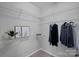 Bright walk-in closet with wire shelving, providing ample storage and organization space at 9118 Pine Springs Ct, Huntersville, NC 28078