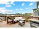Inviting back deck with comfortable seating and scenic views at 10161 Castlebrooke Dr, Concord, NC 28027