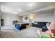 Finished basement with a pool table, comfortable seating, and plush carpeting at 10161 Castlebrooke Dr, Concord, NC 28027