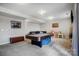 This finished basement is a blank canvas with a pool table, couch, TV and lots of space at 10161 Castlebrooke Dr, Concord, NC 28027
