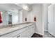 Bathroom with double vanity, granite countertop, and tiled floors at 10161 Castlebrooke Dr, Concord, NC 28027