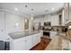 Well-equipped kitchen featuring granite countertops, stainless steel appliances, and ample cabinet space at 10161 Castlebrooke Dr, Concord, NC 28027