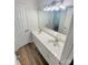 Bathroom featuring a dual vanity, modern sinks, and bright vanity lighting at 1090 Briarcliff Rd, Mooresville, NC 28115