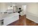 Bright kitchen featuring white cabinets, stainless steel appliances, and quartz countertops at 1090 Briarcliff Rd, Mooresville, NC 28115