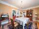 Traditional dining room with chandelier and classic furnishings, ideal for Gathering gatherings at 11 Tallassee St, Badin, NC 28009