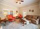 Spacious living room with plush seating, neutral walls, and elegant coffee table at 11 Tallassee St, Badin, NC 28009