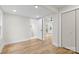 Bright bedroom featuring vinyl floors and a walk-in closet at 121 Tanglewood Dr, Kannapolis, NC 28081