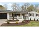 Beautifully renovated brick home with stylish accents and manicured landscaping at 121 Tanglewood Dr, Kannapolis, NC 28081