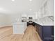 This kitchen features an island, stainless appliances and gorgeous marble countertops at 121 Tanglewood Dr, Kannapolis, NC 28081