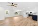 Open-concept living space with luxury vinyl plank flooring and an eat-in kitchen at 121 Tanglewood Dr, Kannapolis, NC 28081