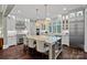 Stylish kitchen features island seating, stainless steel appliances, and modern cabinetry at 138 Great Point Dr, Mooresville, NC 28117