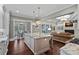 Spacious kitchen showcases stone countertops, island seating, and stainless steel appliances at 138 Great Point Dr, Mooresville, NC 28117