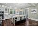 Gourmet kitchen with center island seating, pendant lights, and stainless steel appliances at 138 Great Point Dr, Mooresville, NC 28117