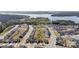 New construction community with water views and sidewalks showcases neighborhood layout and nearby wooded areas at 15126 Shallow Ridge Rd, Charlotte, NC 28278