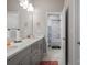 Bright bathroom with double sinks, modern fixtures, and a shower with a stylish curtain at 15126 Shallow Ridge Rd, Charlotte, NC 28278