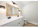 Bathroom boasts a dual vanity, framed mirror, and natural light at 157 Fraley Rd, Gastonia, NC 28052