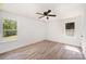 Bedroom with lots of natural light from windows and wood flooring at 157 Fraley Rd, Gastonia, NC 28052
