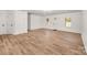 The space features light wood flooring, neutral walls, recessed lighting and lots of natural light from the windows at 157 Fraley Rd, Gastonia, NC 28052