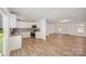 The kitchen features modern white cabinets, granite countertops, and stainless steel appliances at 157 Fraley Rd, Gastonia, NC 28052