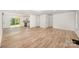 Bright, open-concept living room featuring hardwood floors and natural light at 157 Fraley Rd, Gastonia, NC 28052