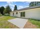 The back of the house shows a concrete patio accessible via sliding glass doors at 157 Fraley Rd, Gastonia, NC 28052