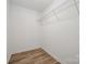 Walk-in closet features a wire rack and wood flooring at 157 Fraley Rd, Gastonia, NC 28052