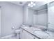 Bathroom featuring double sinks, granite countertops, and a shower-tub combination at 15964 Cumnor Ln, Charlotte, NC 28277