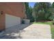 Exterior shot highlighting the attached garage and extended driveway at 15964 Cumnor Ln, Charlotte, NC 28277