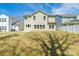 Back view of house, showing windows and siding at 162 Aspire Cir, Wingate, NC 28174