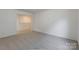 Spacious bedroom featuring neutral-colored walls and carpet at 162 Aspire Cir, Wingate, NC 28174