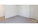 Spacious, carpeted room with a white door at 162 Aspire Cir, Wingate, NC 28174
