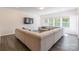 A comfortable living room with ample seating, large windows, and modern decor at 162 Aspire Cir, Wingate, NC 28174