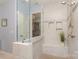 Walk-in shower with tiled walls and glass door at 19650 Harbor Watch Ct, Lancaster, SC 29720